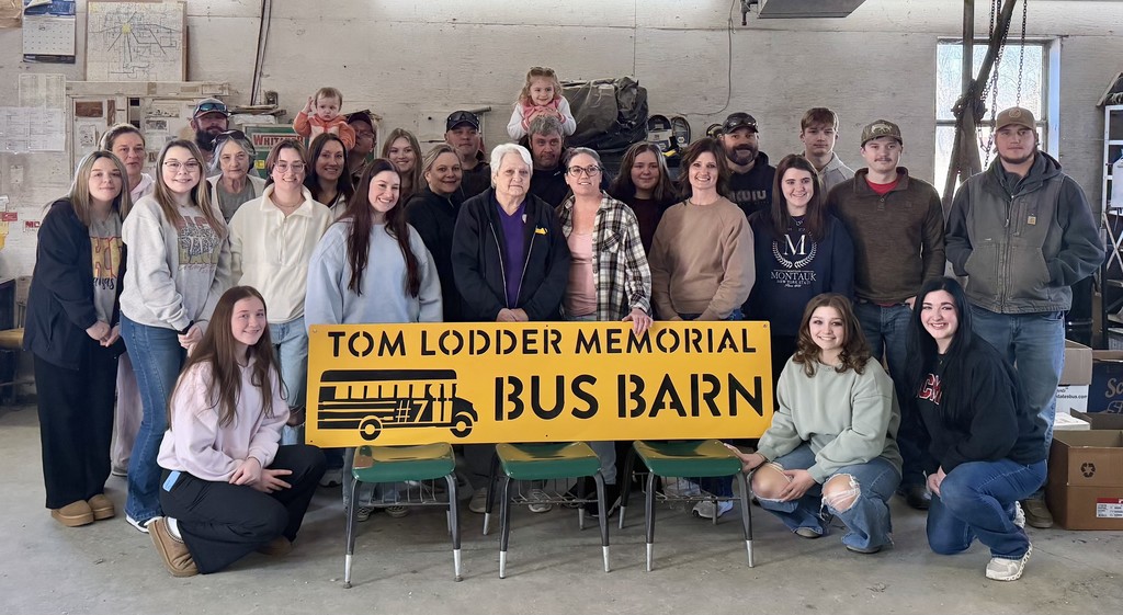 Tom's family with the sign 1