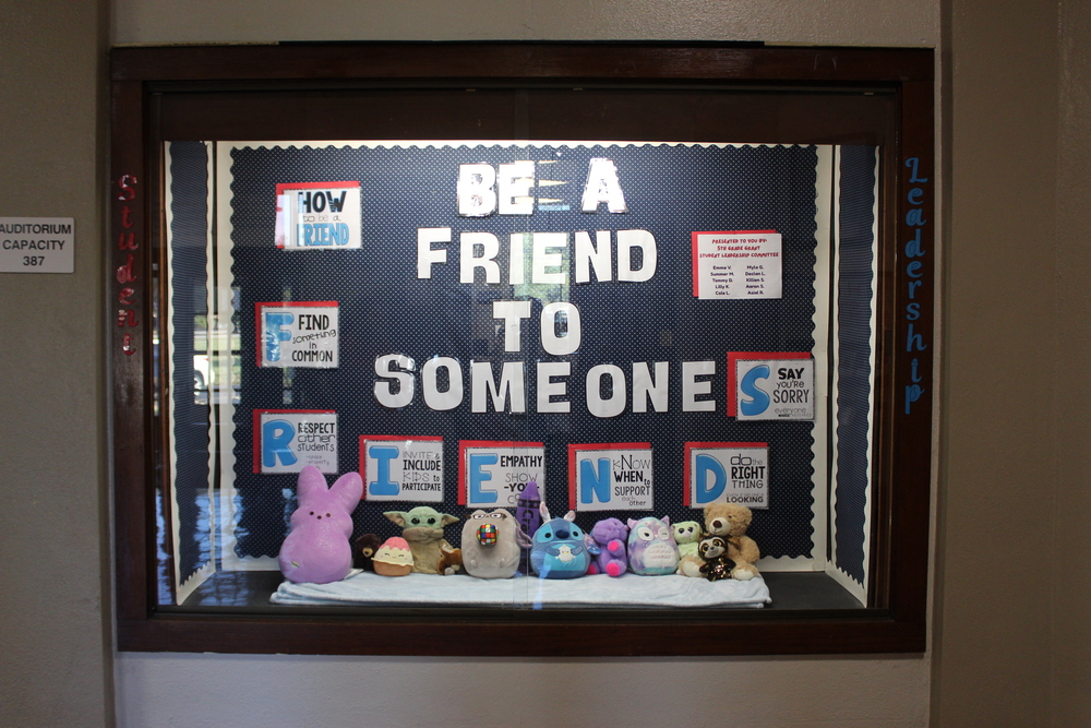 Image of "Be a friend to someone ' bulletin board