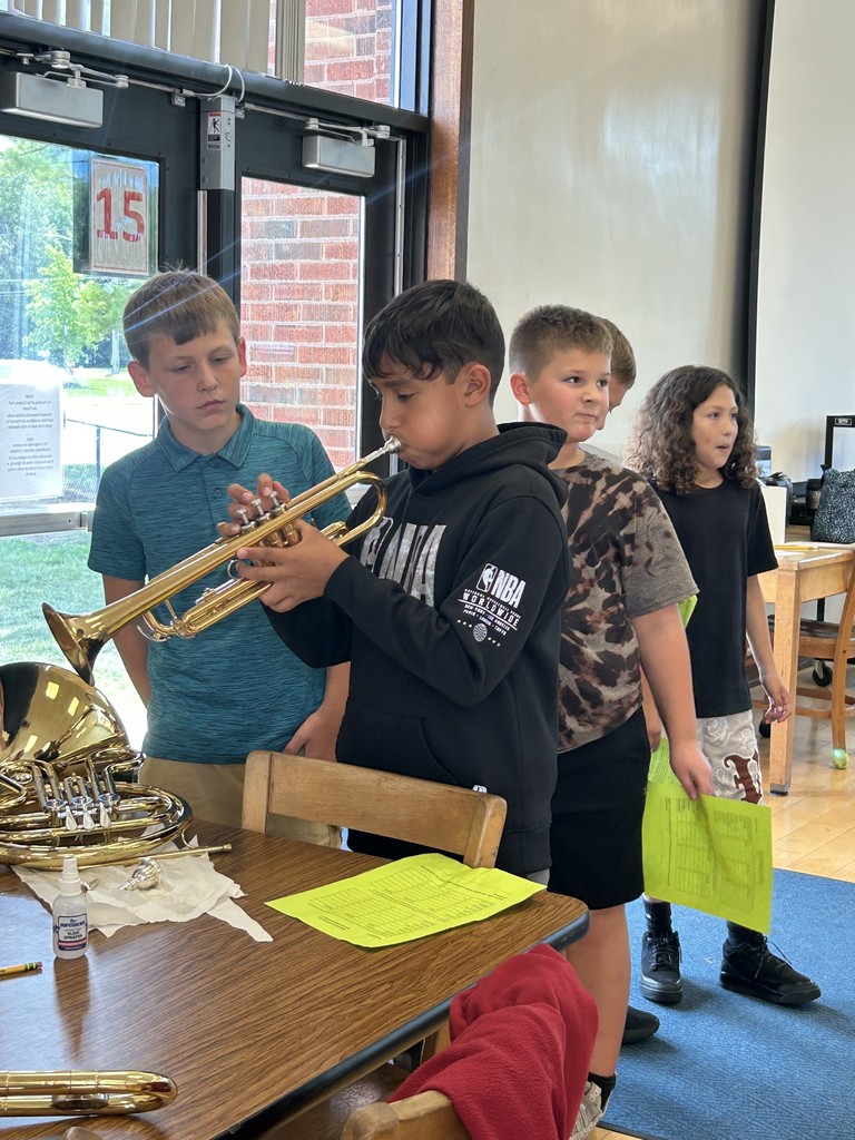 Trying out the trumpet
