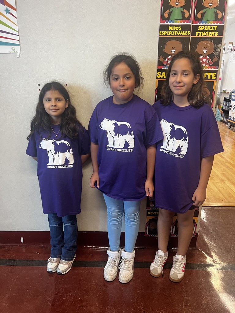 3 4th grade students dressed in matching Grant tshirts