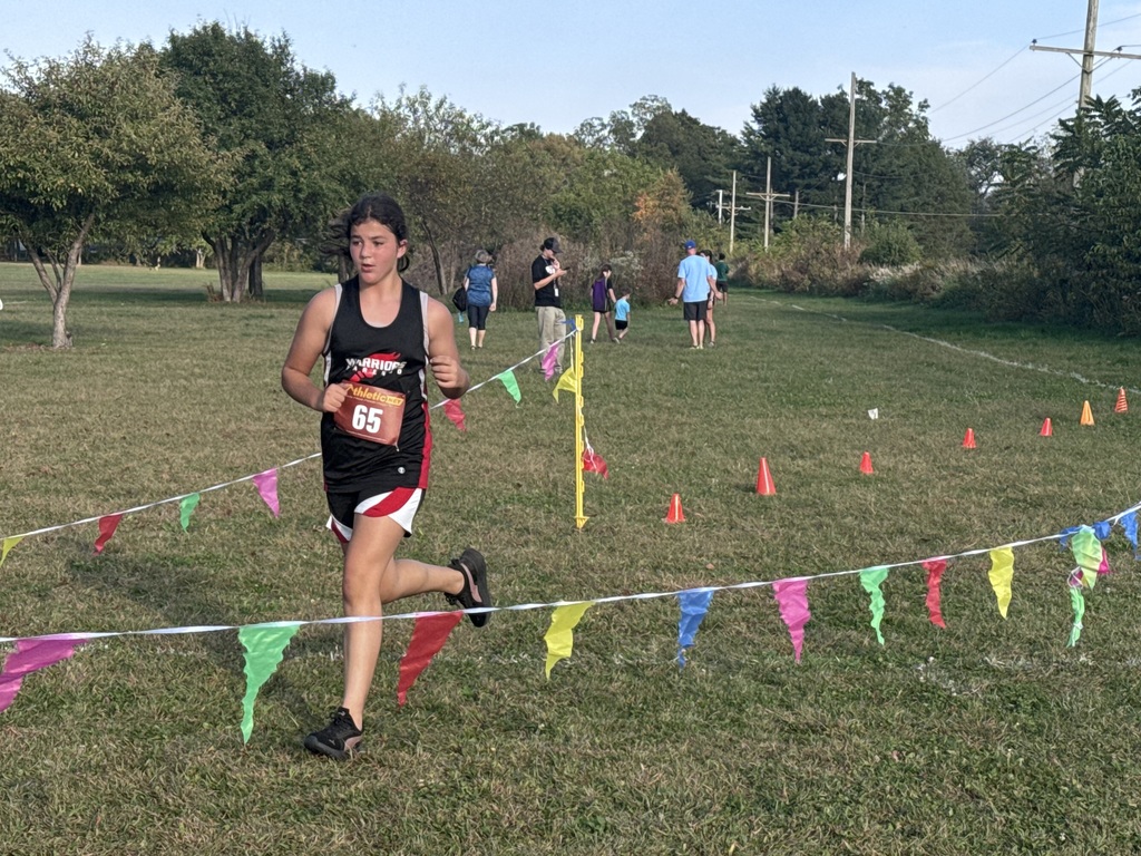 girl runs to finish line