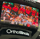 5th grader on a jumbotron at the ice hogs game
