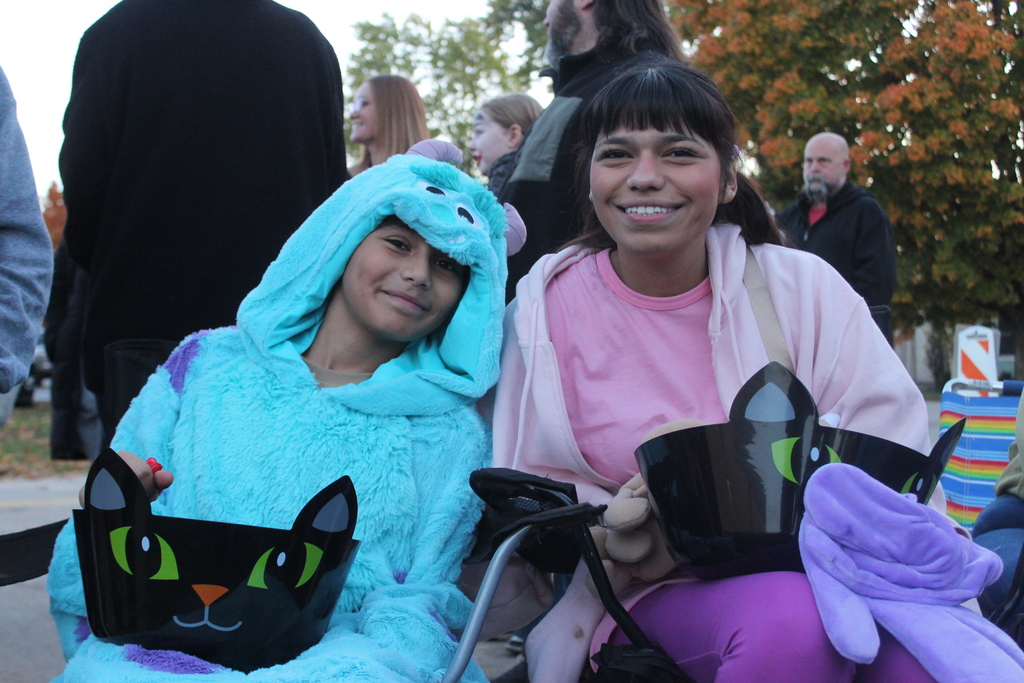 Brother and sister dressed up as monsters Inc Characters
