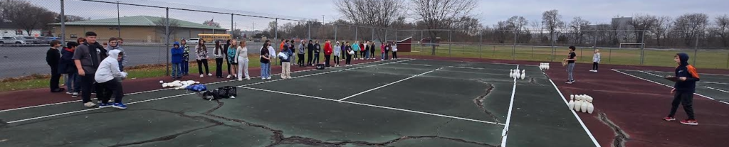 Students enjoying turkey bowling.