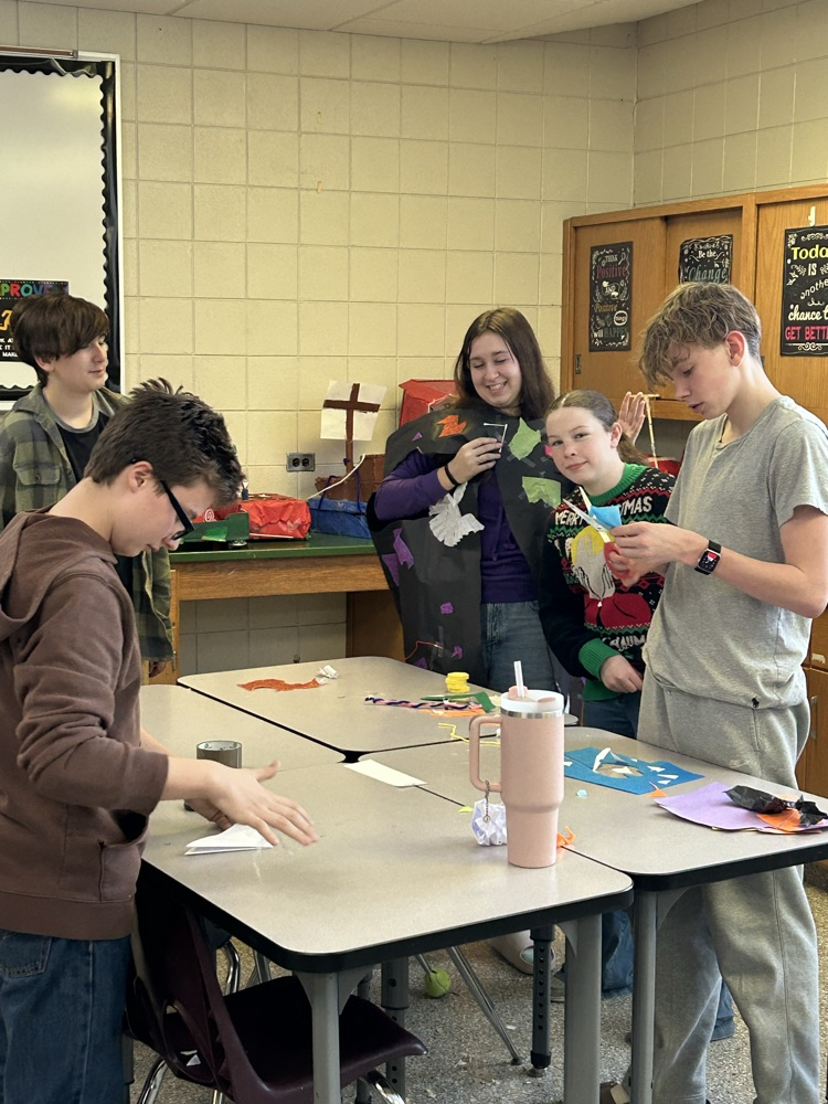 8th Grade STEM students designed an Ugly Sweater for Mr. Burke.