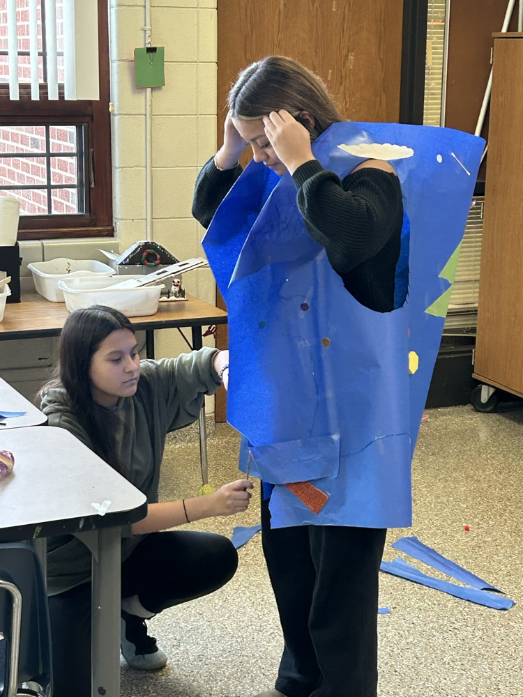 8th Grade STEM students designed an Ugly Sweater for Mr. Burke.