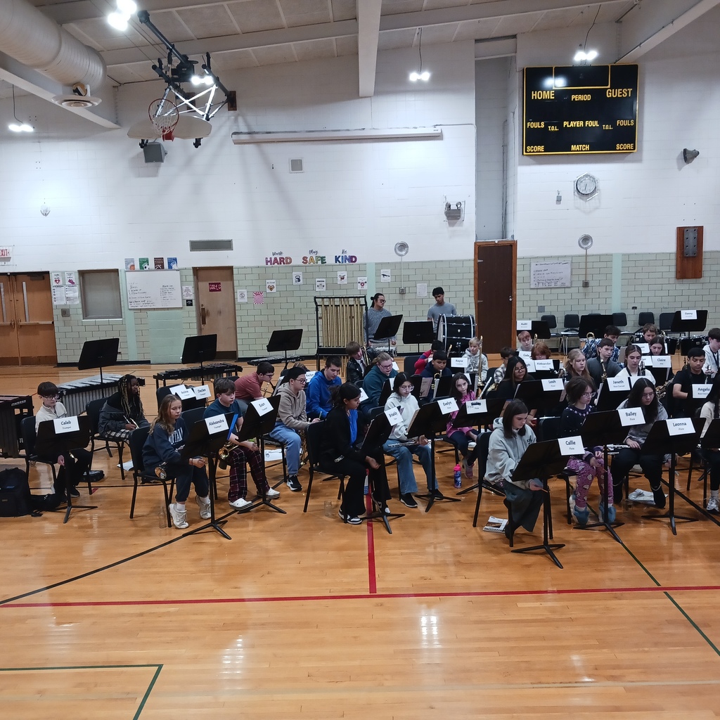 Left side of the band taking notes.