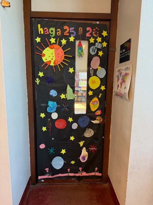 Classroom door decorated for contest with planets