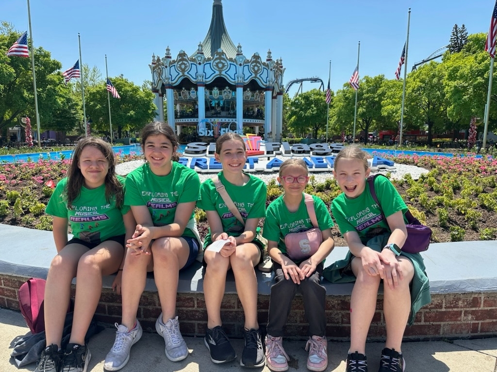 In front of the carousel.