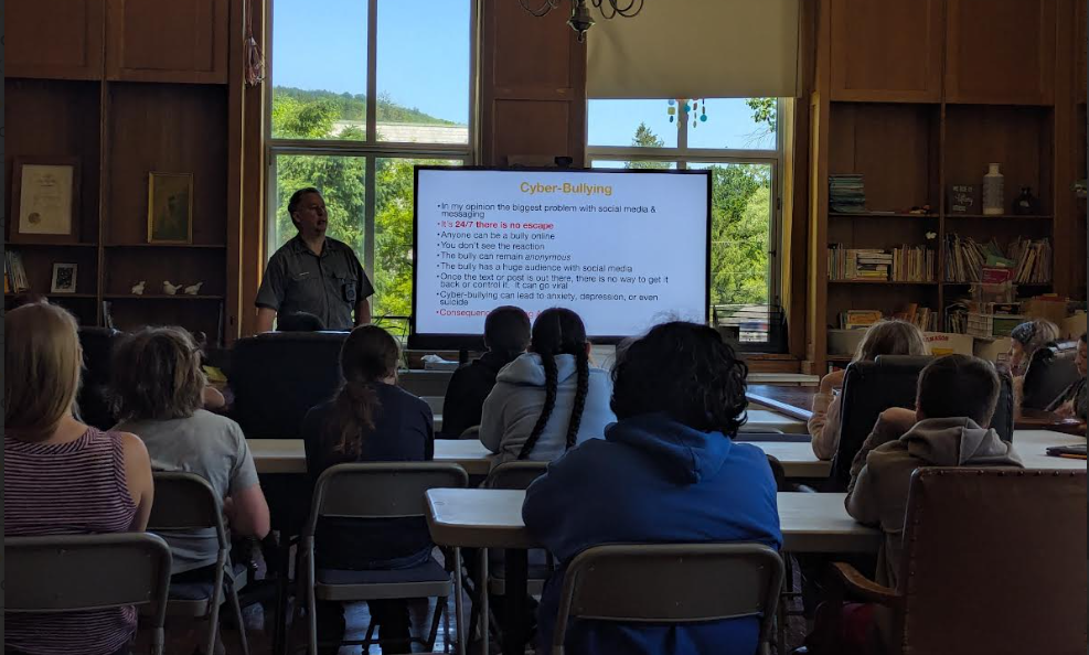 Officer Neumuth presenting to students