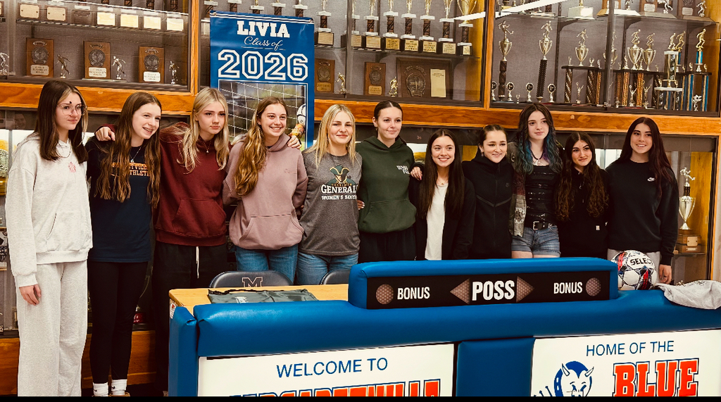 Livy with her parents, teammates and coaches!