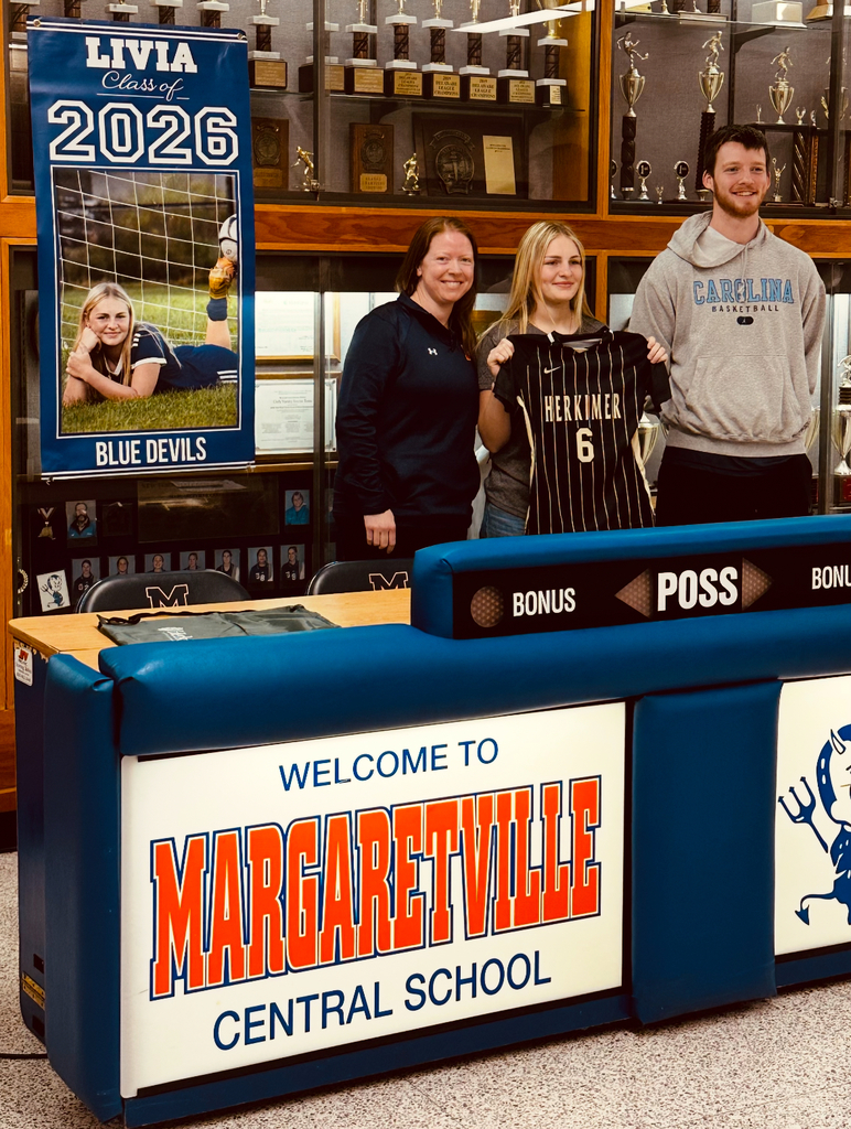 Livy with her parents, teammates and coaches!