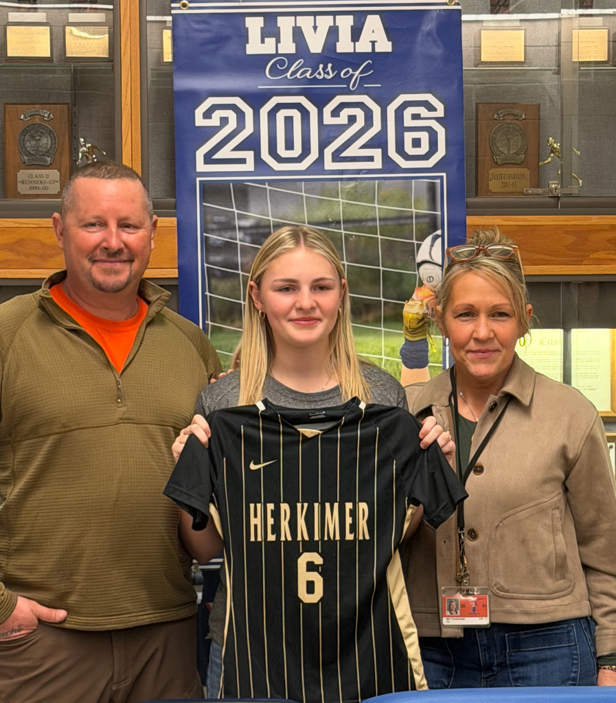 Livy with her parents, teammates and coaches!