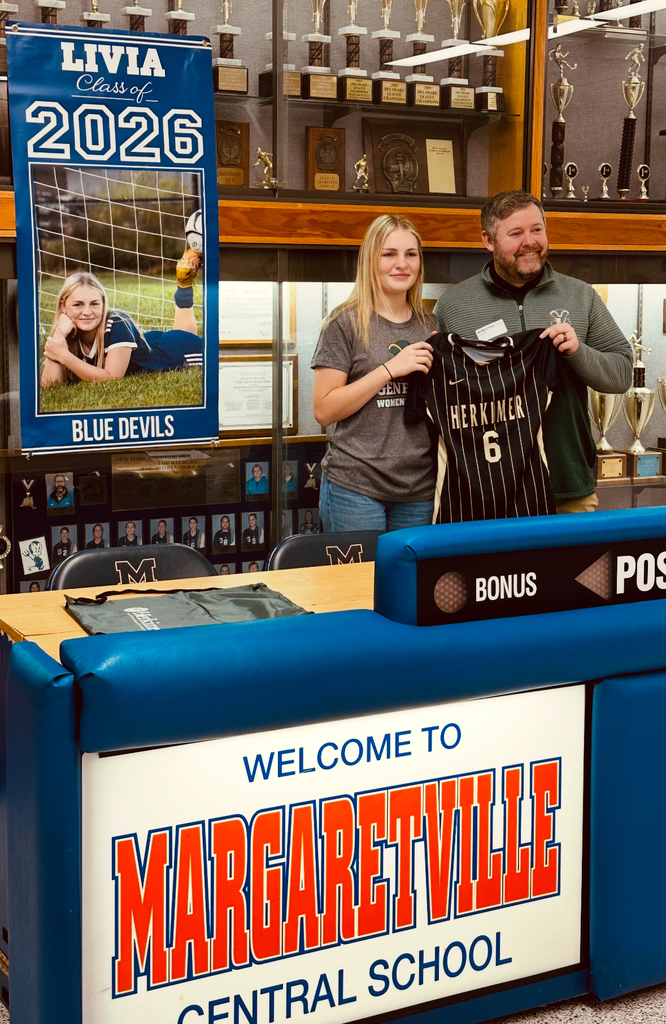 Livy with her parents, teammates and coaches!