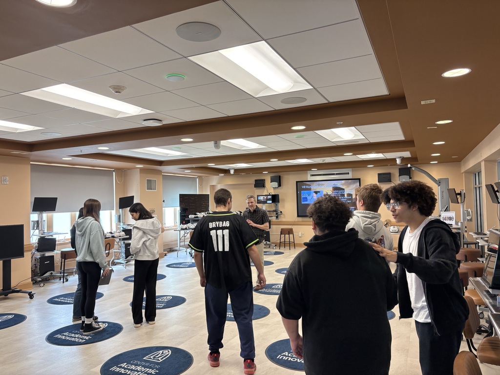 Students explored the virtual reality classroom used by health science students to practice clinical experiences in healthcare settings.