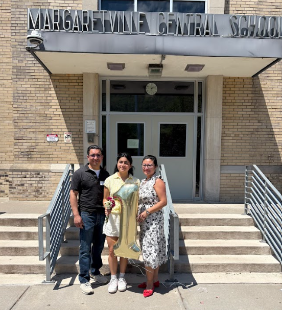 Valedictorian with family