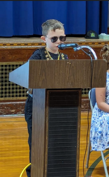Student presenting as Dwayne the Rock Johnson