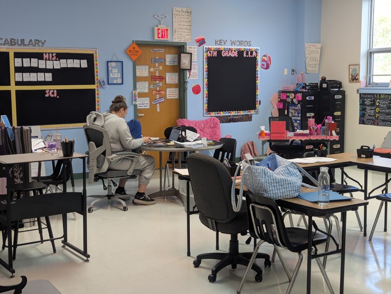 Faculty working on conference day