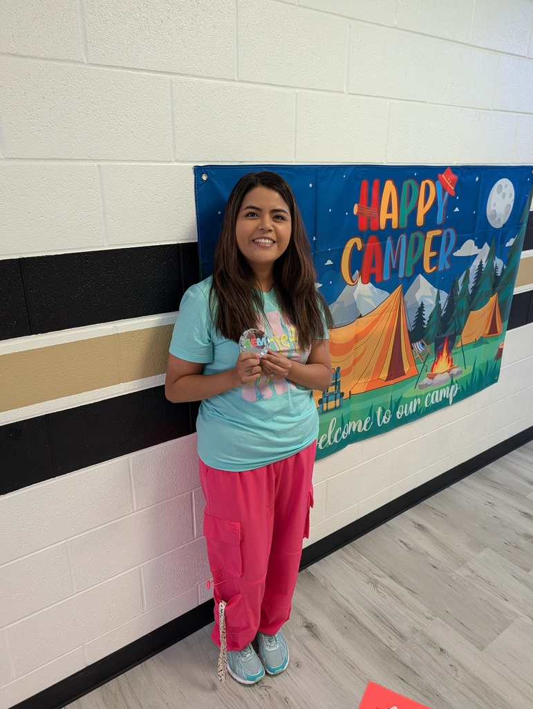 Jessica Hice posing in the hallway with her GEM.