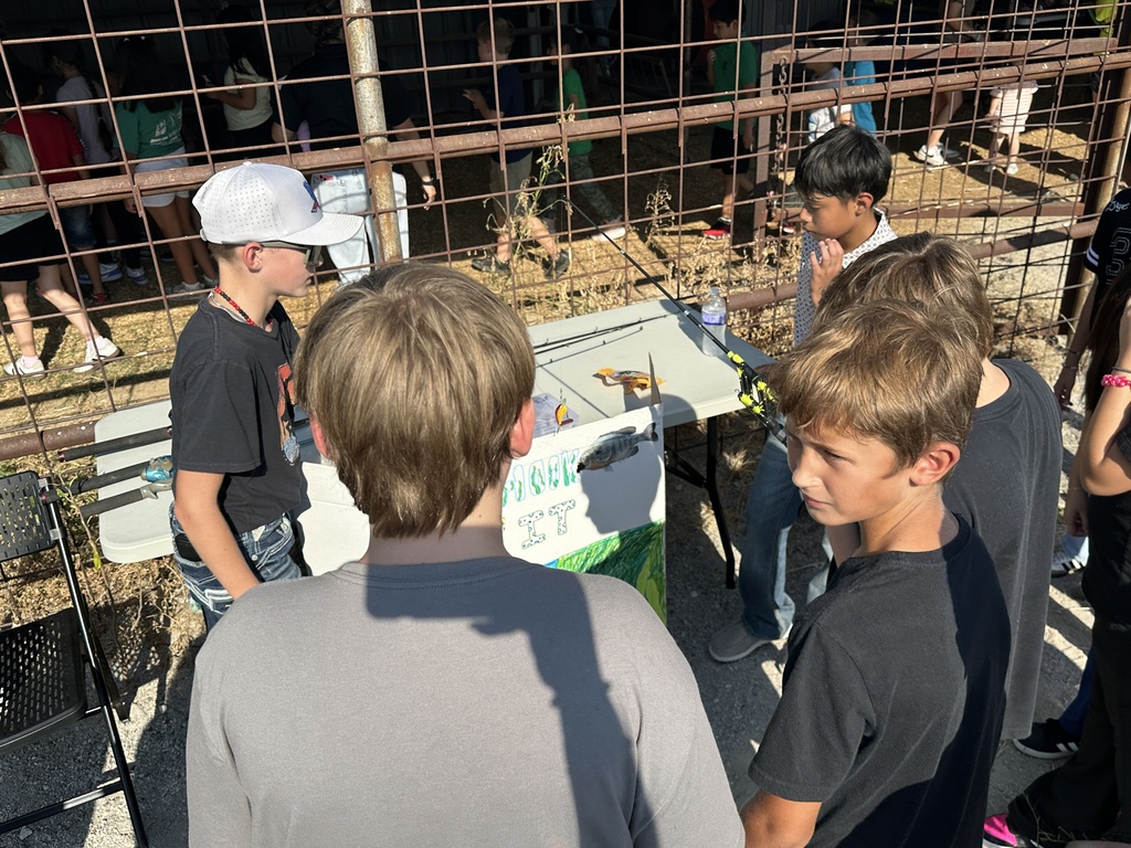 students learning about fishing