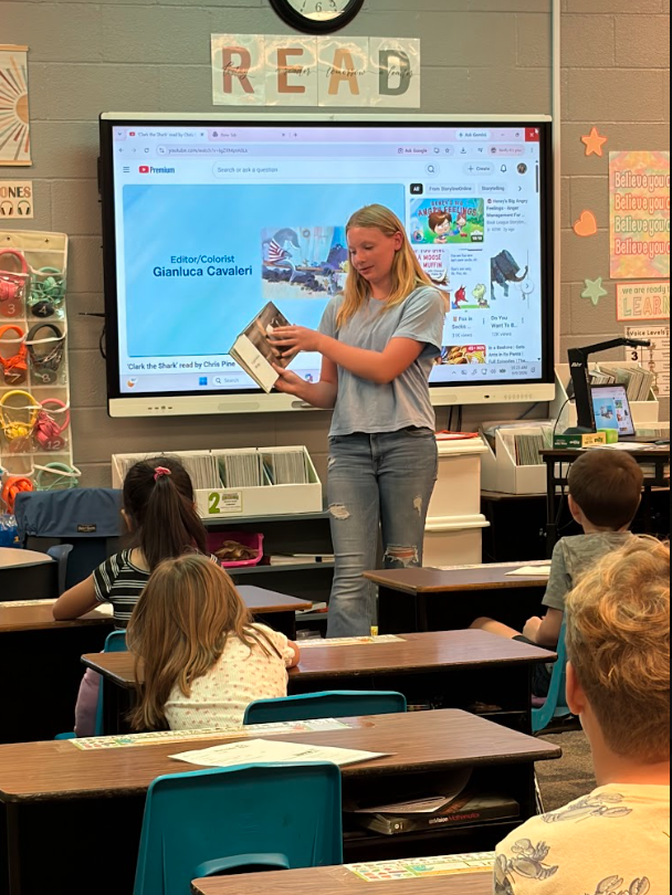 reading to students in classroom