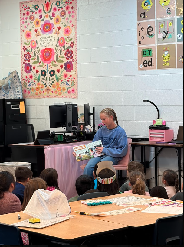 reading to students in classroom