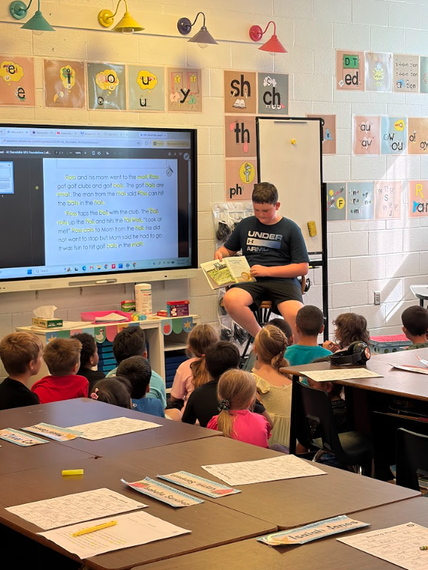 reading to students in classroom
