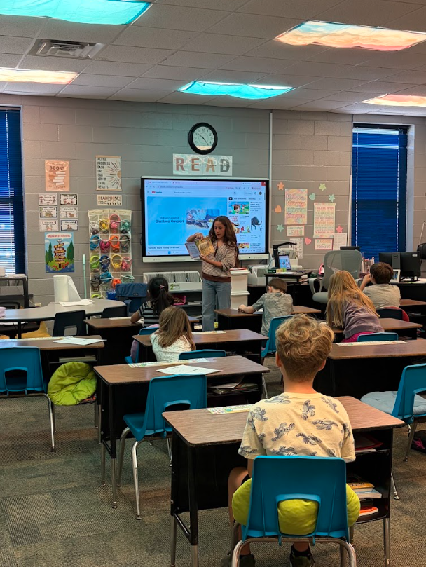 reading to students in classroom
