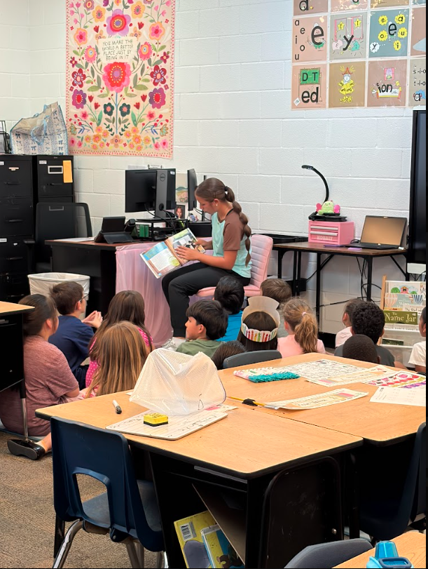 reading to students in classroom