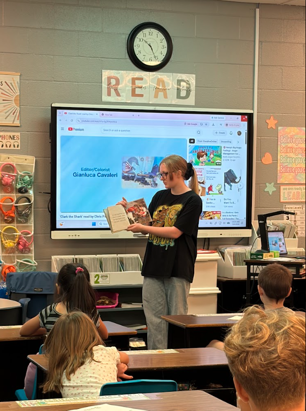 reading to students in classroom