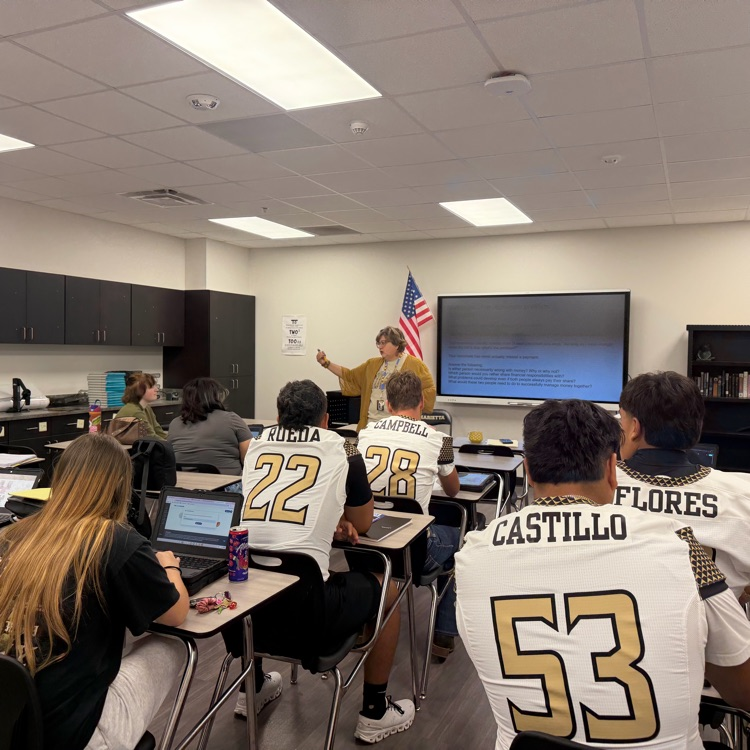 seniors working on graduation tasks 