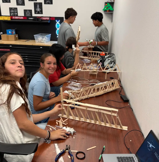 Pictures of students building bridges