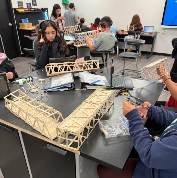 Pictures of students building bridges