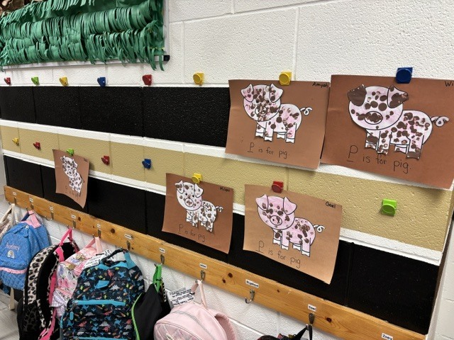 pig art in hallway