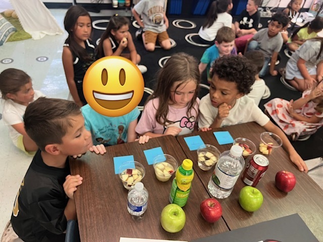 students doing apple experiment