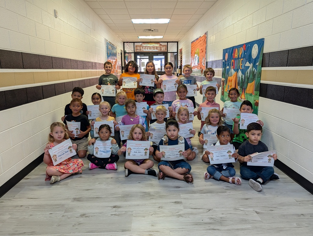 students of the month in the hallway