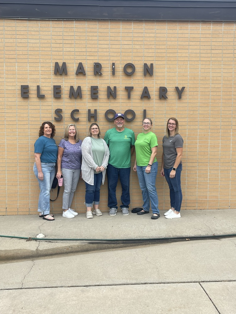 Tampa State Bank employees pose for a picture at MES.