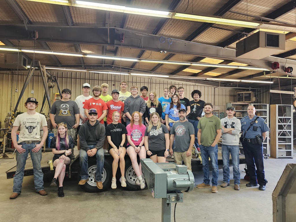 Seniors class after doing car maintenance.