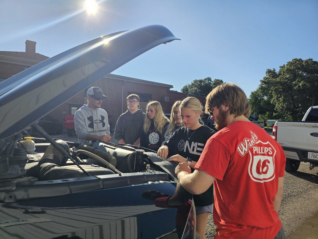Mitch's group goes over how to find all the parts under the hood.