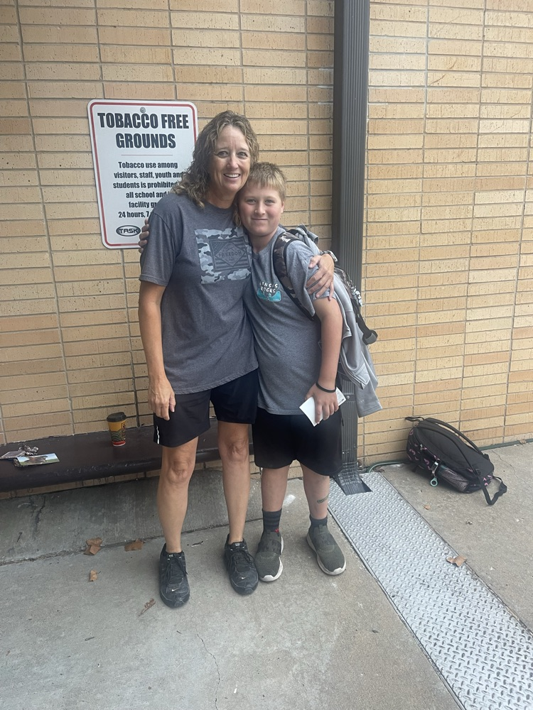 An aunt poses with her nephew on Welcome Wednesday.