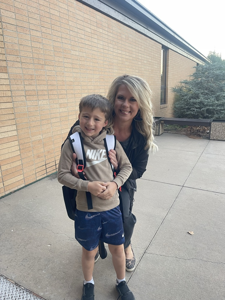 Always fun when your Angela is one of the greeters.  A kindergarten boy is happy to see his grandma when he gets out of the car. 