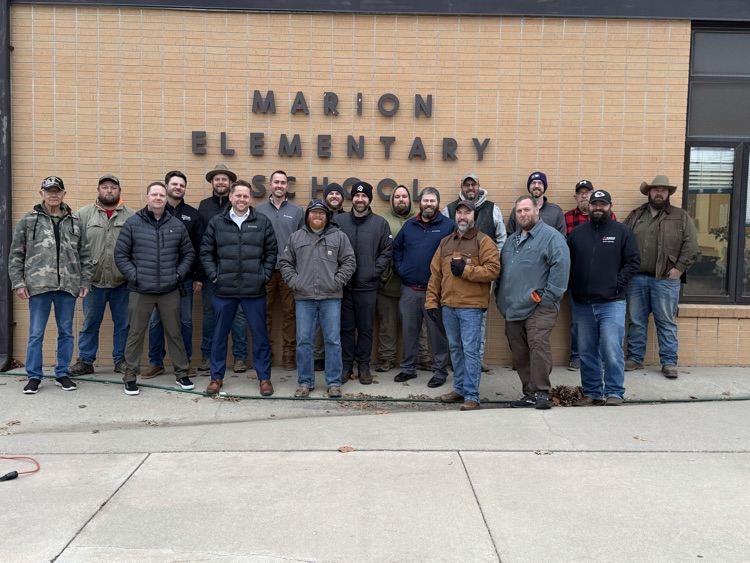 Dads greeting MES students!