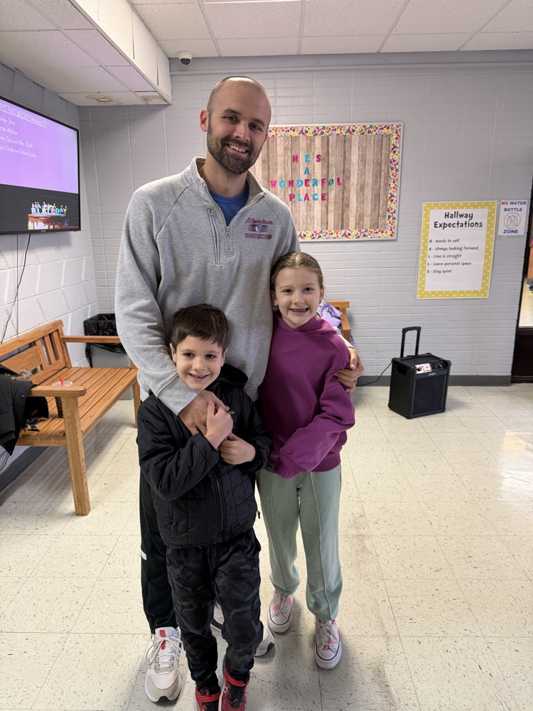 Coach Hett with his son and daughter 