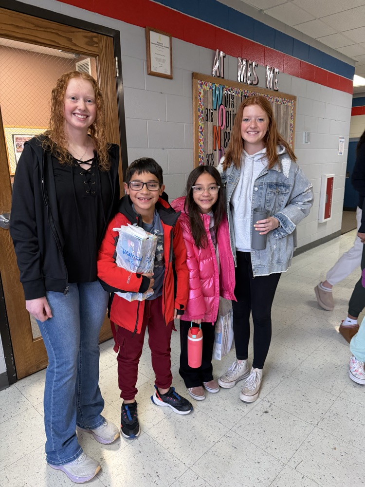 Two MHS players with their two younger siblings 