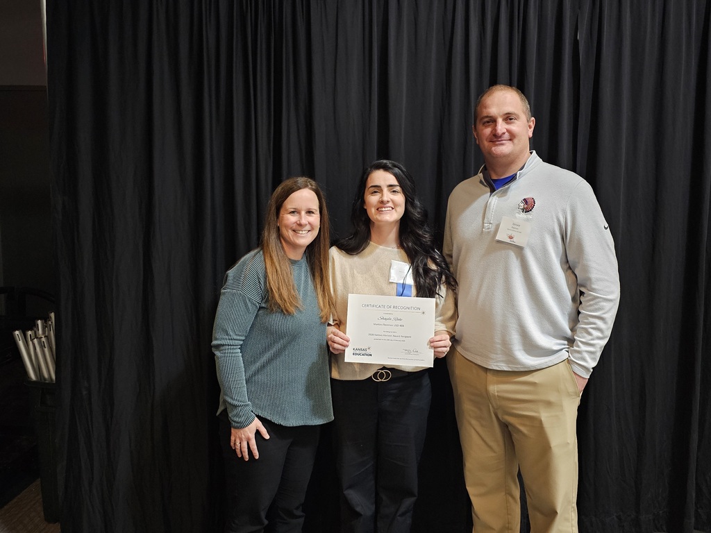Mrs. Thomas, Ms. Rahe, and Mr. Raymer after the awards. 