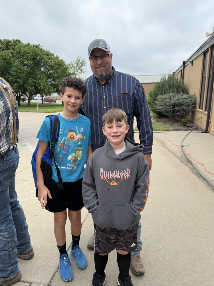 Two students with their dad