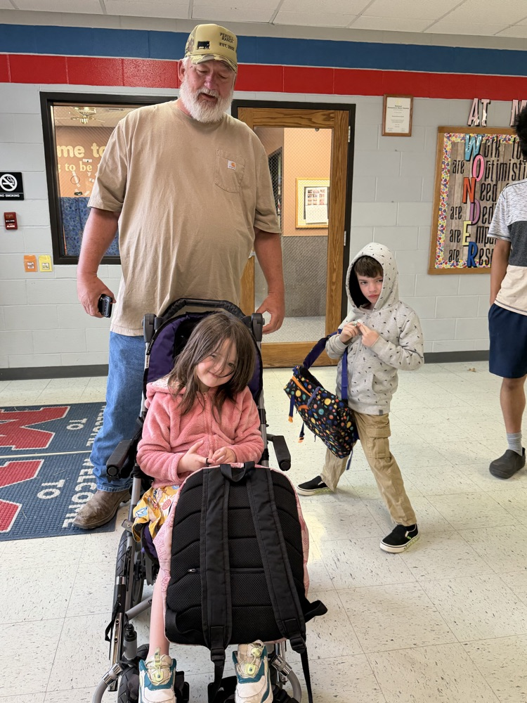 Two students with Grandpa