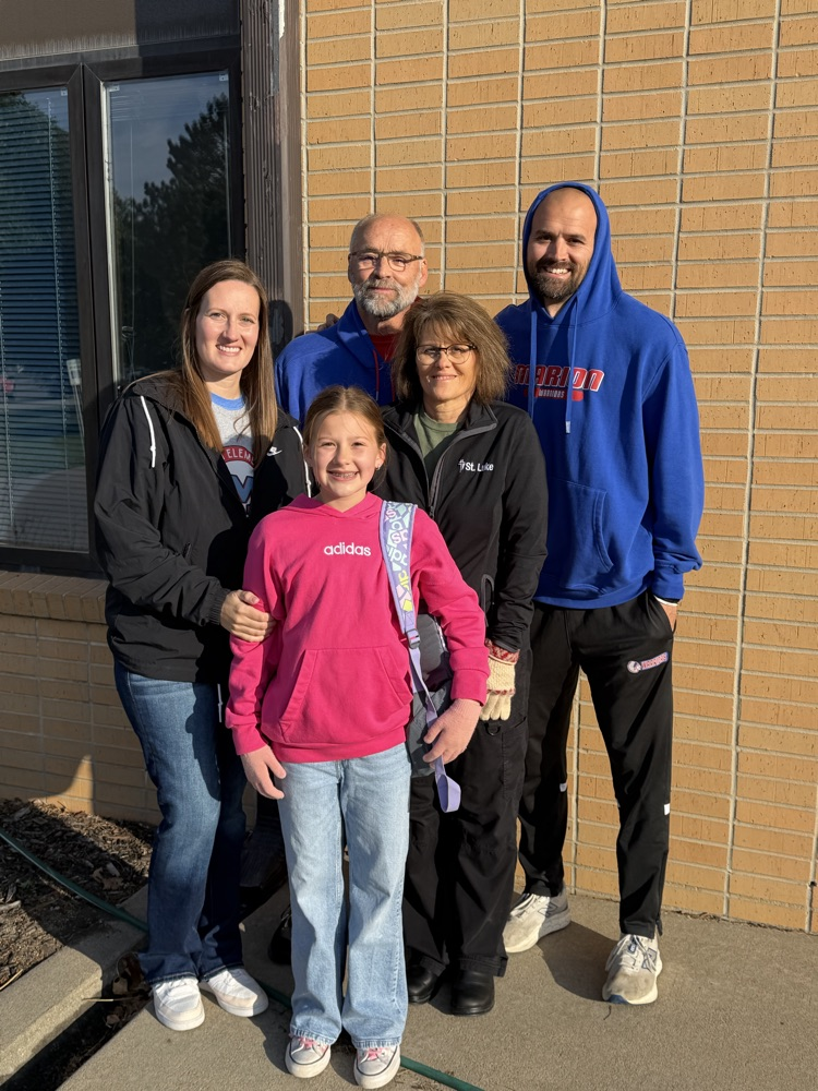 Parents and grandparents with a MES student