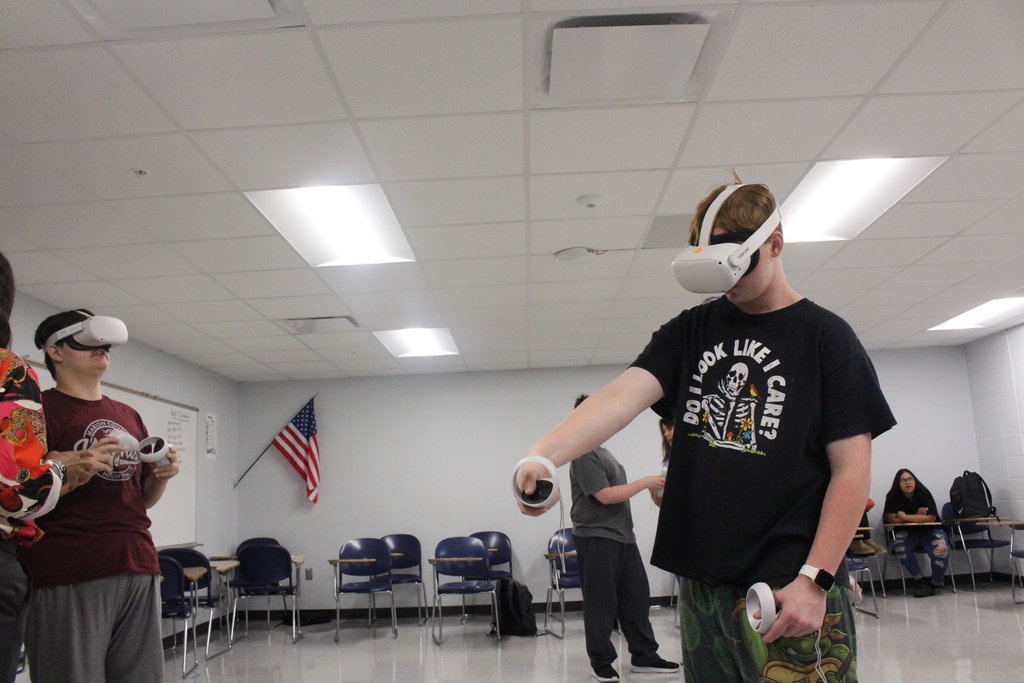 Students wearing VR goggles