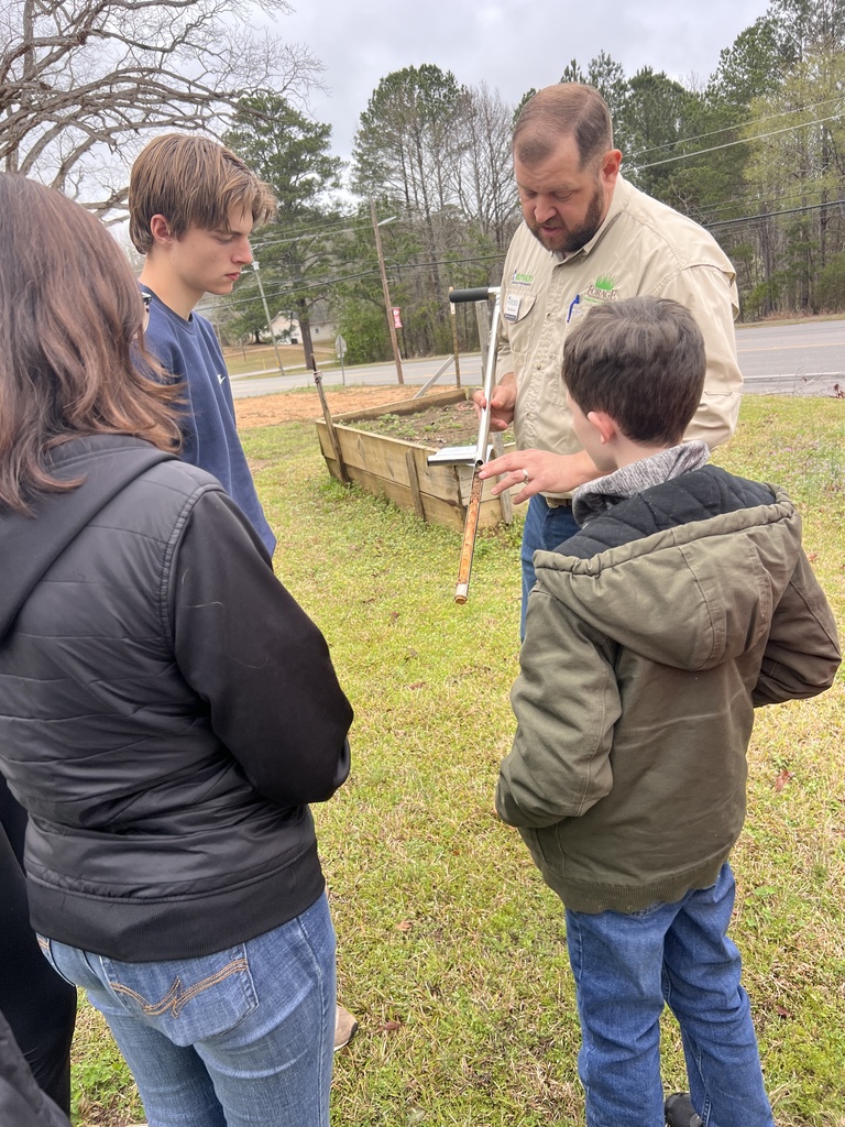 Zack explaining layers of the soil